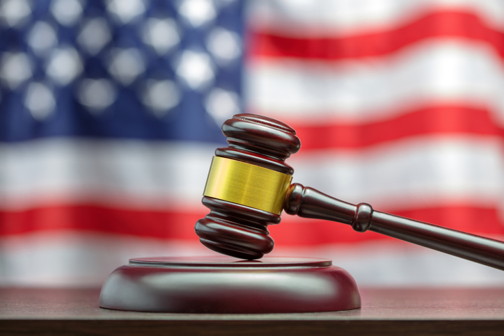 judge's gavel on wooden table